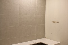 Vanity-Installed-in-Men_s-Restroom-in-Building-Dept