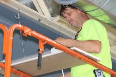 Installing-Lights-in-Gymnasium-2